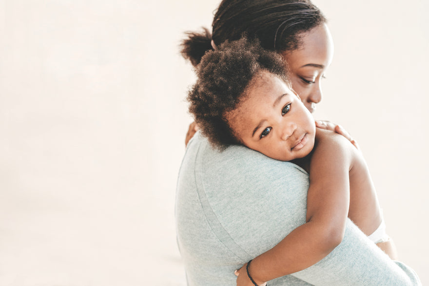 Mom holding baby in arms