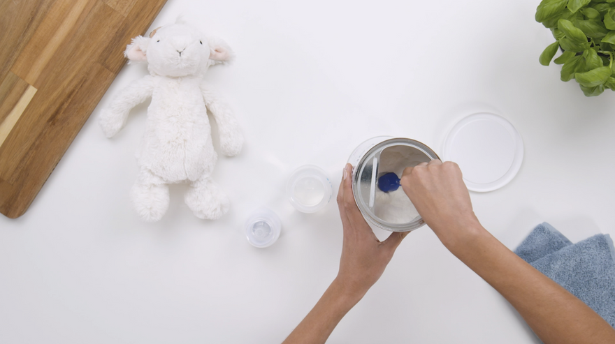 Preparing a bottle of Kabrita Goat Milk Formula