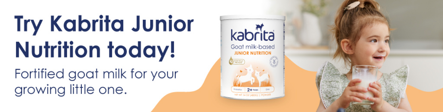 Little girl enjoying a glass of Kabrita Junior Nutrition. Titled: Try Kabrita Junior Nutrition Today!